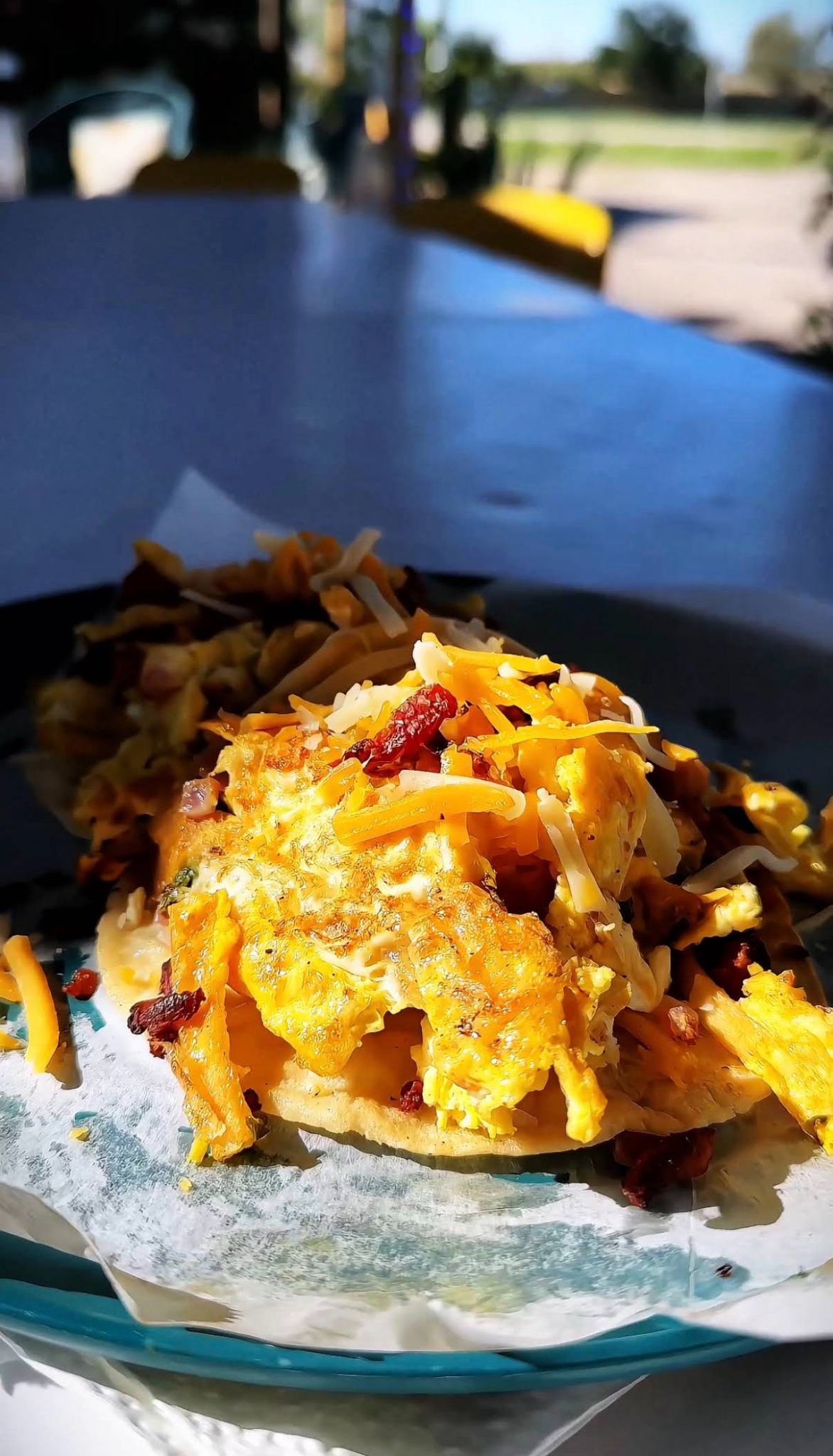 Migas breakfast tacos with eggs, cheese and crispy tortilla pieces
